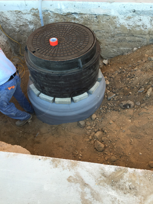 H-20 traffic manhole with frame, cover, and composite grades rings 