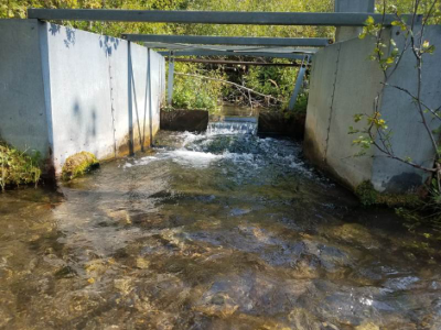 galvanized steel parshall flume measuring water rights in Colorado