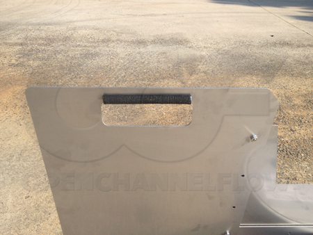 cushioned lift handle on weir plate carrier