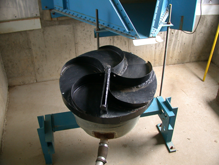 Coshocton runoff sampler below painted steel H flume