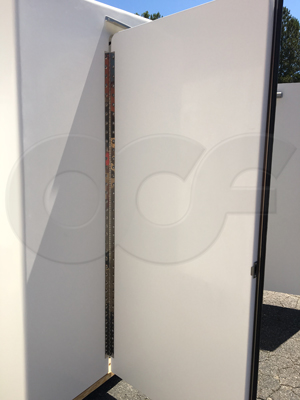 close-up of a piano hinge mounting a 3068 door on a fiberglass equipment shelter