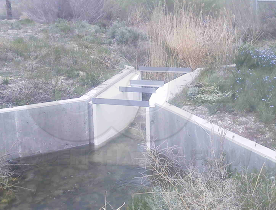 24-inch fiberglass Parshall flume measuring pond discharge