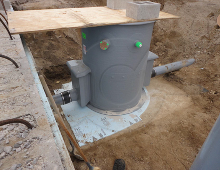 an open top fiberglass Packaged Metering Manholes used as an industrial Flow Sampling Station