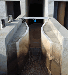sanitary flow through a Parshall flume