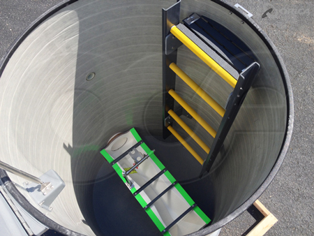 interior of a fiberglass packaged metering manhole with a extra large 60 degree v trapezoidal flume