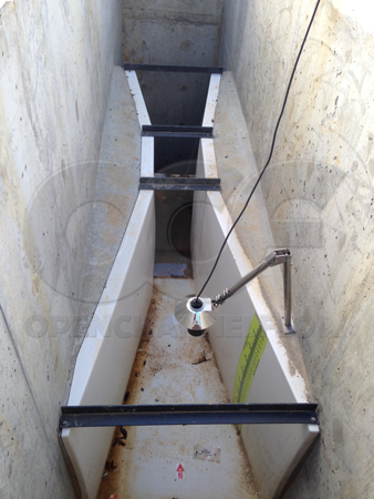 Fiberglass 12-inch Parshall Flume with Bowed Inlet Walls Due to Insufficient Cribbing (Bracing) During Installation