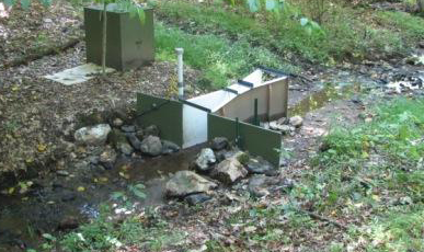 above grade Parshall flume lacking exterior gel coat