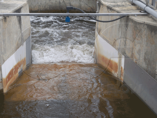 Parshall flume flow corrected by new inlet wing wall