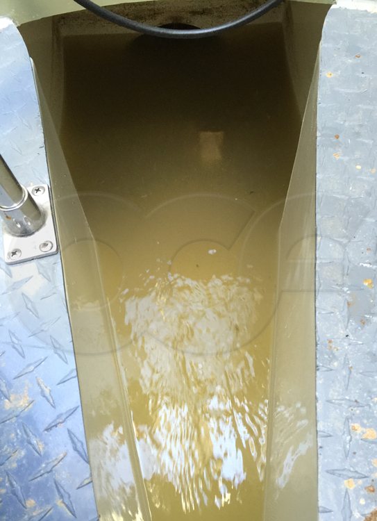 smooth flow into a Parshall flume using radius inlet wing walls