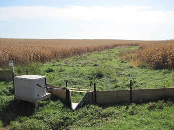plywood walls directing flow into a h flume measuring edge-of-field flows