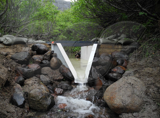 H flume with earthen bank surrounding