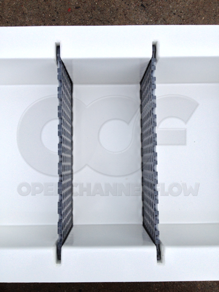 set of removable flow conditioning perforated baffle plates in 0.5-Foot H flume approach section