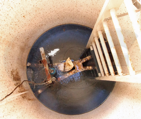surcharged Parshall flume in a fiberglass packaged metering manhole