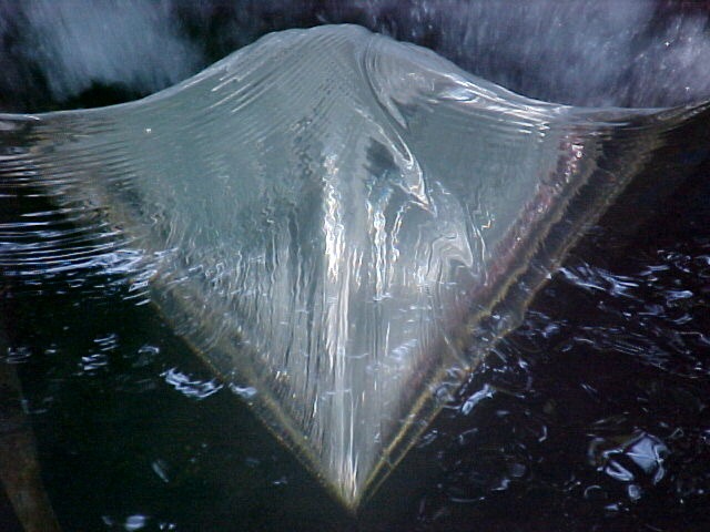 side contraction of the weir nappe