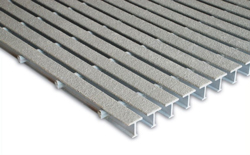narrow opening fiberglass grating used in spill containment floors of fiberglass chemical storage shelters