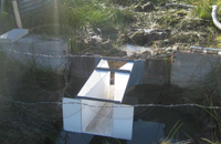 flat wing walls on the discharge of a Cutthroat flume