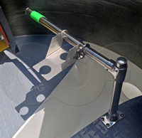 Ultrasonic transducer bracket over a Parshall flume in an Openchannelflow Packaged Metering Manhole