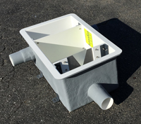 piped flow coming into the side of an Openchannelflow fiberglass weir box